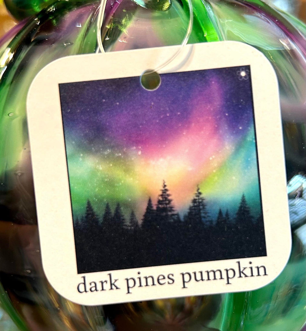 #100  Dark Pines Collector's Tag